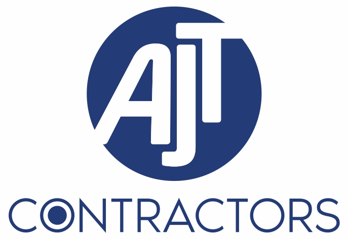 The image shows a logo for "AJT Contractors." The letters "AJT" are white and creatively arranged within a solid blue circle, forming the main part of the logo. Below the circle, the word "CONTRACTORS" is written in blue capital letters.